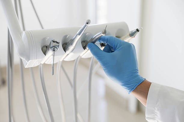 Professional Tooth Extraction technician working in Bay City, OR